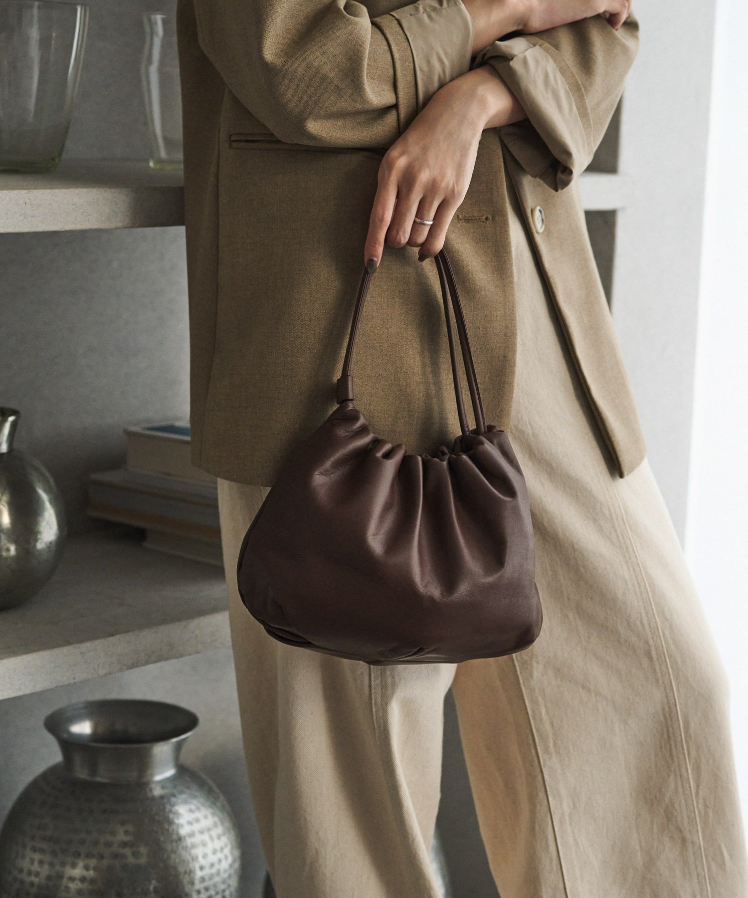 【ラシット/russet】のレザー巾着4WAYショルダーバッグ インテリア・キッズ・メンズ・レディースファッション・服の通販 founy(ファニー) 　ファッション　Fashion　レディースファッション　Fashion for Women　バッグ　Bags　イエロー　Yellow　オケージョン　Occasion Wear　クラッチ　Clutch, Clutch Bag　コンパクト　Compact, Small Size　巾着　Drawstring Bag, Kinchaku　軽量　Lightweight, Ultra Light　ショルダー　Shoulder, Shoulder Strap　シルバー　Silver, Metallic Silver　シンプル　Simple, Minimal　スタイリッシュ　Stylish, Fashionable　フォルム　Silhouette, Form　ベーシック　Basic, Essential　ポケット　Pocket, Pocket Detail　メタリック　Metallic, Shiny Finish　日本製　Made In Japan　エレガント 上品　Elegant　セレモニー　Ceremony　ダークブラウン|ID: prp329100004666556 ipo3291000000036073437