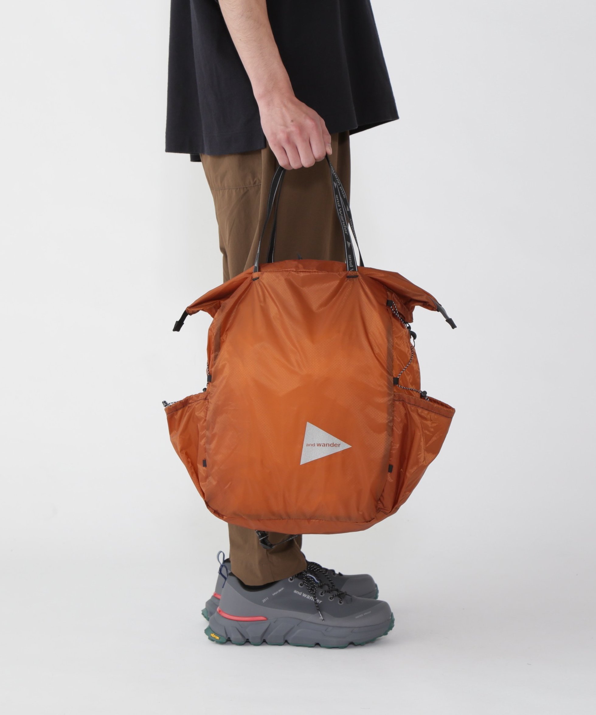【アンドワンダー/and wander】のsil tote bag インテリア・キッズ・メンズ・レディースファッション・服の通販 founy(ファニー) 　ファッション　Fashion　レディースファッション　Fashion for Women　バッグ　Bags　コーティング　Coating, Coated Finish　シリコン　Silicone, Silicone Material　ポケット　Pocket, Pocket Detail　ラップ　Wrap, Wrap Design　旅行　Travel　d.orange2|ID: prp329100004820797 ipo3291000000035032912