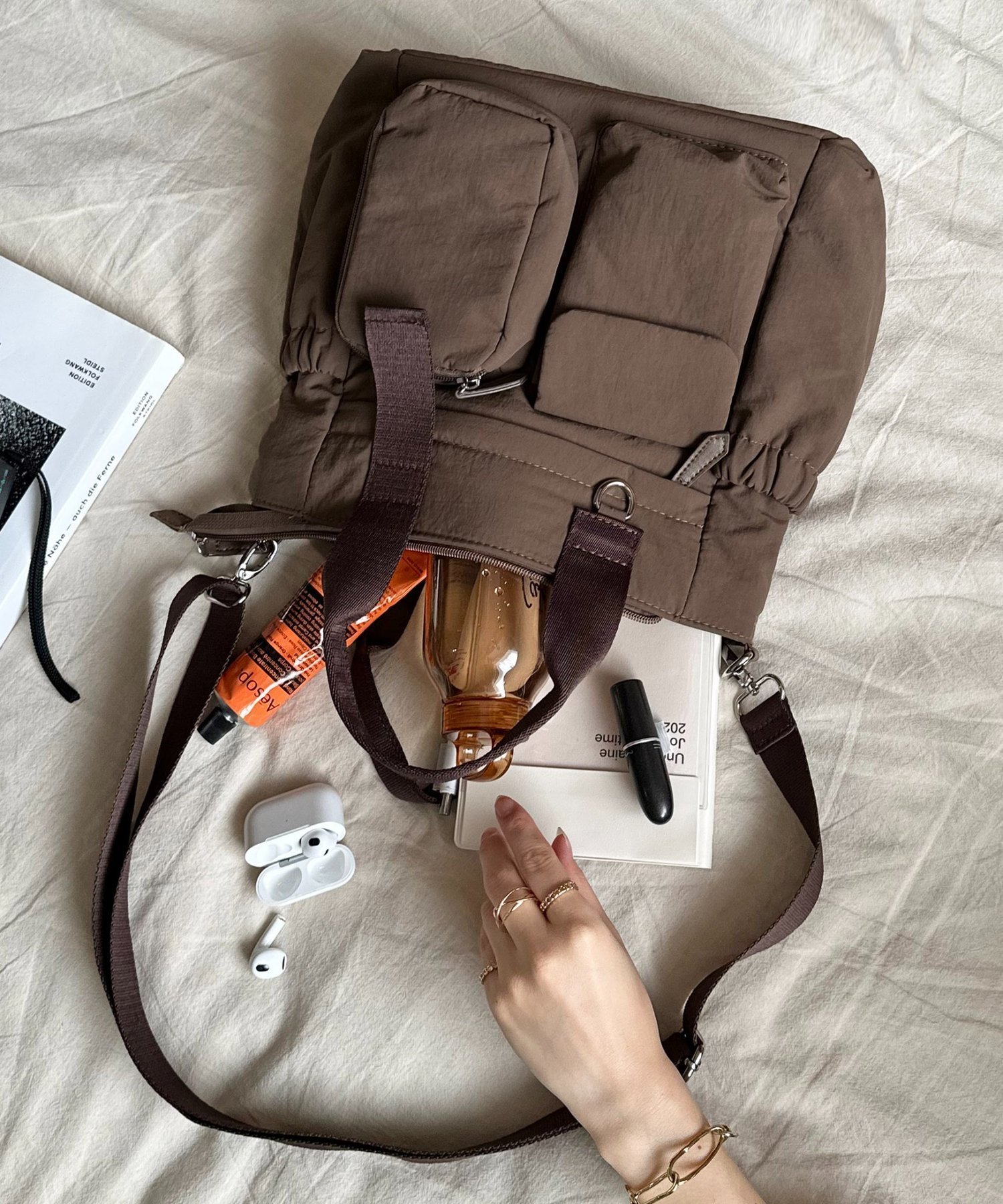 【ディスコート/Discoat】のユーティリティパフィトートバッグ インテリア・キッズ・メンズ・レディースファッション・服の通販 founy(ファニー) 　ファッション　Fashion　レディースファッション　Fashion for Women　バッグ　Bags　キーホルダー　Keychain, Key Holder　ギャザー　Gathered, Ruffled　コンパクト　Compact, Small Size　ショルダー　Shoulder, Shoulder Strap　ベーシック　Basic, Essential　ポケット　Pocket, Pocket Detail　旅行　Travel　スーツケース キャリーケース　Suitcase / Carry Case　ビジネス 仕事 通勤　Business / Work / Commuting　ブラウン|ID: prp329100004835210 ipo3291000000035219882