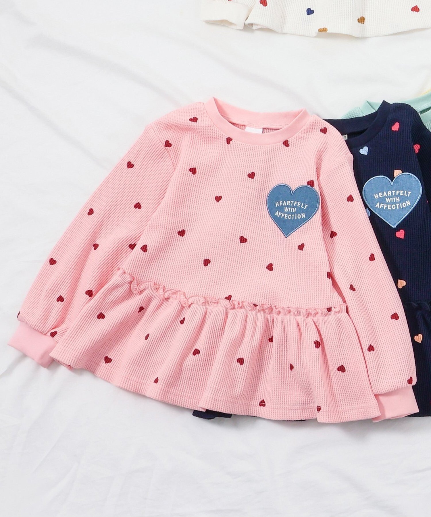 【エフオー オンラインストア/F.O.Online Store / KIDS】の【新色追加】ワッフルペプラムハートモチーフTシャツ インテリア・キッズ・メンズ・レディースファッション・服の通販 founy(ファニー) 　ファッション　Fashion　キッズファッション　Fashion for Kids　ペプラム　Peplum, Flared Hem　長袖　Long Sleeve, Full Sleeve　ピンク|ID: prp329100004880334 ipo3291000000036424024