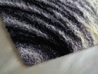 【山形緞通/Yamagata Dantsu / GOODS】のDESIGNERS LINE - KEN KIYOYUKI OKUYAMA - NAMI / デザイナーズライン - 奥山 清行 - 波 毛足の長いシャギー専用の光沢羊毛糸が使用され、心地よい肌触りです。|ID:prp329100000009438
