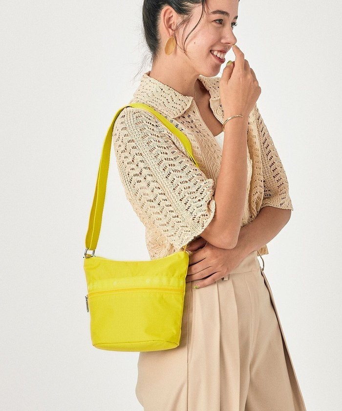 【レスポートサック/LeSportsac】のMINI BUCKET SHOULDER BAG/プリムローズイエロー インテリア・キッズ・メンズ・レディースファッション・服の通販 founy(ファニー) https://founy.com/ ファッション Fashion レディースファッション WOMEN アウトドア Outdoor イエロー Yellow 軽量 Lightweight ショルダー Shoulder シンプル Simple スマート Smart 財布 Wallet バケツ Bucket プリント Print ポケット Pocket ポーチ Pouch 無地 Plain Color おすすめ Recommend 旅行 Travel |ID: prp329100003972670 ipo3291000000026435069