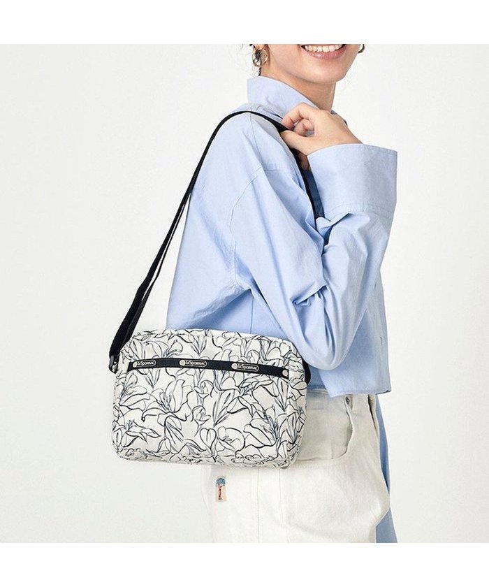 【レスポートサック/LeSportsac】のDANIELLA CROSSBODY/スケッチフローラルアイボリー インテリア・キッズ・メンズ・レディースファッション・服の通販 founy(ファニー) https://founy.com/ ファッション Fashion レディースファッション WOMEN おすすめ Recommend アウトドア Outdoor コンパクト Compact フラワー Flower プリント Print ポケット Pocket エレガント 上品 Elegant 旅行 Travel 財布 Wallet |ID: prp329100004033561 ipo3291000000026814689