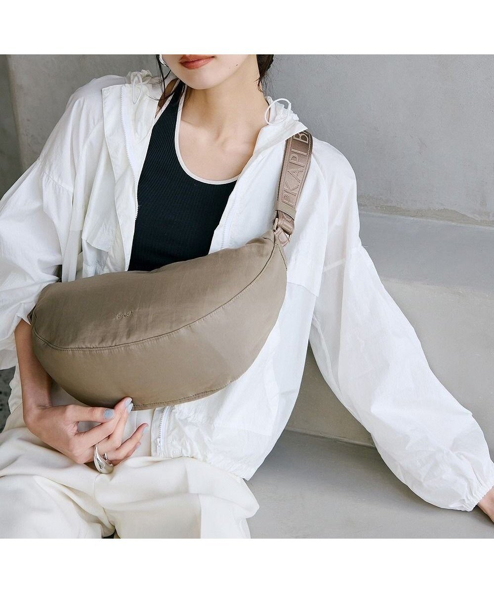 【トプカピ/TOPKAPI】の【Breath TOPKAPI】Freely フリーリー ナイロン ロゴテープ ラウンド ショルダーバッグ インテリア・キッズ・メンズ・レディースファッション・服の通販 founy(ファニー) 　ファッション　Fashion　レディースファッション　Ladies' Fashion Online　バッグ　Bag　ショルダー　Shoulder　財布　Wallet　ハーフ　Half　フィット　Fit　フォルム　Form　ポケット　Pocket　ラウンド　Round　ワンポイント　One Point　ベージュ|ID: prp329100004386504 ipo3291000000032557884