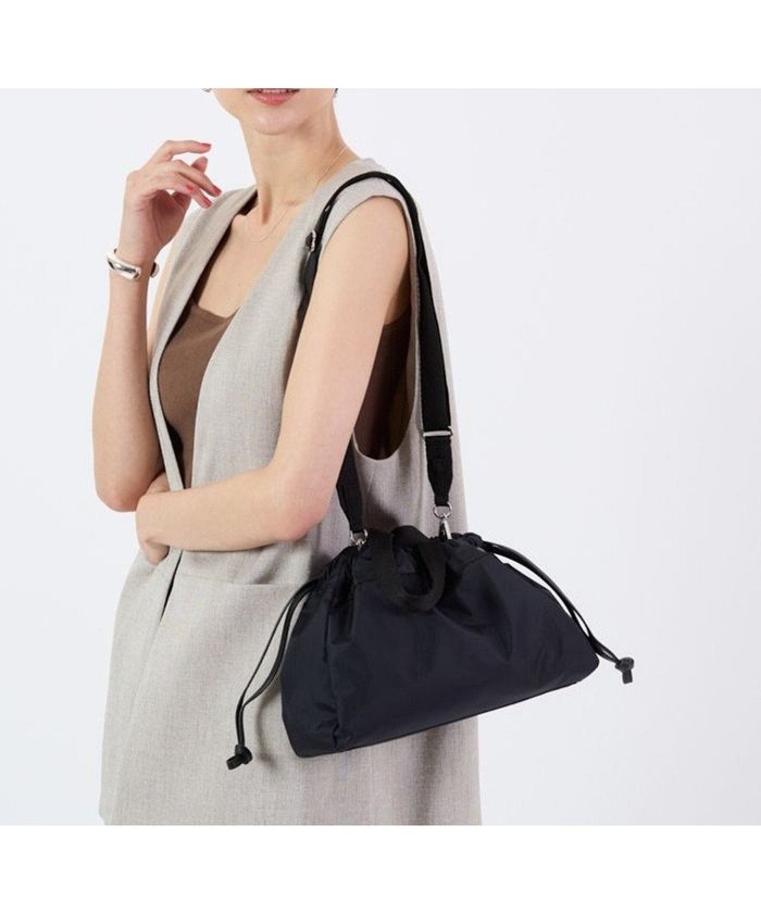 【レスポートサック/LeSportsac】のE/W CITY DRAWSTRING BAG /アップタウンディープシーブルー/ブラック インテリア・キッズ・メンズ・レディースファッション・服の通販 founy(ファニー) https://founy.com/ ファッション Fashion レディースファッション Fashion for Women コンパクト Compact, Small Size 巾着 Drawstring Bag, Kinchaku 軽量 Lightweight, Ultra Light ショルダー Shoulder, Shoulder Strap 財布 Wallet, Purse トレンド Trend, Trending Now フォルム Silhouette, Form プリント Print, Printed Pattern ベーシック Basic, Essential ポケット Pocket, Pocket Detail ポシェット Pochette, Mini Bag ギフト プレゼント Gift / Present |ID: prp329100004661588 ipo3291000000033731616