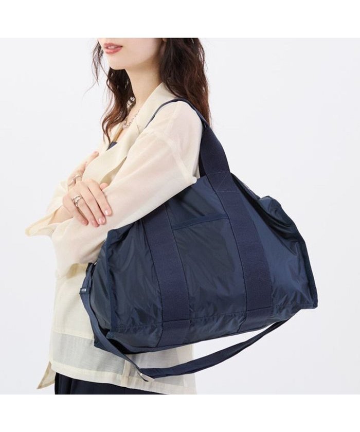 【レスポートサック/LeSportsac】のESSENTIAL MEDIUM DUFFLE/ダークブルーC インテリア・キッズ・メンズ・レディースファッション・服の通販 founy(ファニー) https://founy.com/ ファッション Fashion レディースファッション Fashion for Women アウトドア Outdoor Clothing 軽量 Lightweight, Ultra Light シンプル Simple, Minimal スポーツ Sports, Activewear スポーティ Sporty, Casual Athletic トラベル Travel, Travel Gear 定番 Standard, Basic Item 人気 Popular, Best Seller プリント Print, Printed Pattern ボストン Boston ボストンバッグ Boston Bag, Retro Bag ポケット Pocket, Pocket Detail 無地 Plain, Solid Color ラップ Wrap, Wrap Design おすすめ Recommended / Our Picks 旅行 Travel |ID: prp329100004669396 ipo3291000000033761607