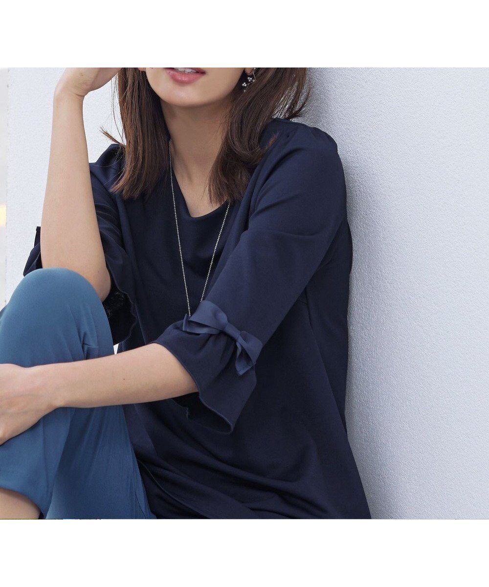 【ティアクラッセ/Tiaclasse】の【洗える】グログランリボン付きフリル袖チュニック インテリア・キッズ・メンズ・レディースファッション・服の通販 founy(ファニー) ファッション Fashion レディースファッション Fashion for Women トップス・カットソー Cut & Sew Tops シャツ・ブラウス・オフィスカジュアル Elegant Blouses & Button-Ups ロングTシャツ・Tシャツ Longline T-Shirts & Tees カットソー・ベーシックTシャツ Cut-and-Sewn Tops / Stretch Tees & Basics ボリューム袖・フリルスリーブブラウス Voluminous & Ruffle Sleeves / Puffy Sleeve Tops ウォッシャブル Machine Washable カットソー Cut and Sewn Top グログラン Grosgrain, Grosgrain Ribbon スリーブ Sleeve, Long Sleeve / Short Sleeve チュニック Tunic, Long Top フェミニン Feminine, Girly フリル Frill, Ruffle フレア Flare, Flared リボン Ribbon, Bow ロング Long, Long-Length エレガント 上品 Elegant 冬 Winter / This Winter 春 Spring 洗える Machine Washable 秋 Autumn A/W・秋冬 Autumn/Winter 長袖 Long Sleeve, Full Sleeve ネイビー|ID: prp329100004674868 ipo3291000000034398576