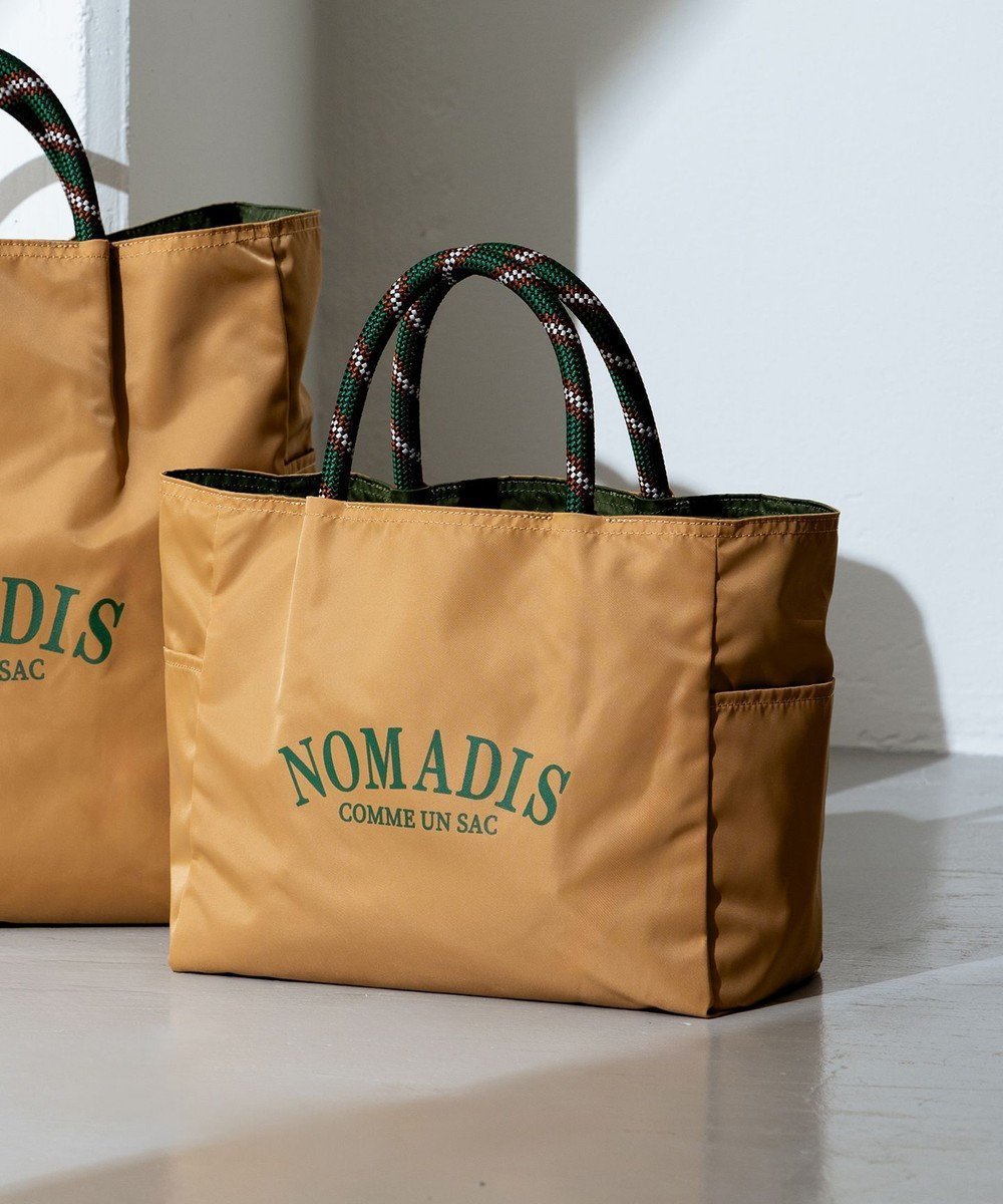 【23区/NIJYUSANKU】のNOMADIS SACリバーシブルトートバッグ(M) インテリア・キッズ・メンズ・レディースファッション・服の通販 founy(ファニー) ファッション Fashion レディースファッション Fashion for Women バッグ Bags アウトドア Outdoor Clothing オレンジ Orange キャンバス Canvas, Canvas Fabric 傘 Umbrella, Parasol シンプル Simple, Minimal タンブラー Tumbler, Travel Mug プリント Print, Printed Pattern ポケット Pocket, Pocket Detail リバーシブル Reversible, Two-Sided S/S・春夏 SS, Spring/Summer, Warm Season 夏 Summer 旅行 Travel 2026年 2026 ベージュ系|ID: prp329100004864342 ipo3291000000036201719