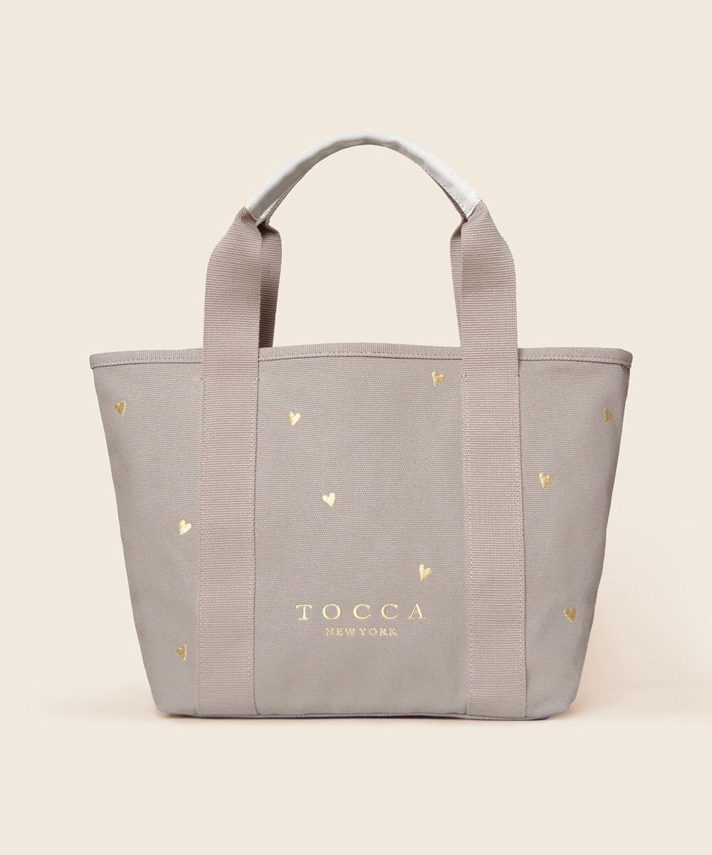 【トッカ/TOCCA】の【大人百花コラボカラー有・WEB&一部店舗限定】LUCKY SHOWER CANVASTOTE キャンバス トートバッグ インテリア・キッズ・メンズ・レディースファッション・服の通販 founy(ファニー) 　ファッション　Fashion　レディースファッション　Fashion for Women　バッグ　Bags　アウトドア　Outdoor Clothing　キャンバス　Canvas, Canvas Fabric　財布　Wallet, Purse　テクスチャー　Texture, Textured Fabric　フェミニン　Feminine, Girly　フロント　Front, Front Design　ポケット　Pocket, Pocket Detail　モチーフ　Motif, Design Theme　リボン　Ribbon, Bow　リュクス　Luxury, Elegant, High-End, Chic　ワンポイント　One Point, Statement Accent　旅行　Travel　ビジネス 仕事 通勤　Business / Work / Commuting　[新色]ベージュ×ゴールドハート柄|ID: prp329100004921782 ipo3291000000036928428